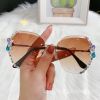 Fashion Diamond rimless Trimmed Sunglasses Women's Fashion Anti UV Slimming Sunglasses - Graded powder
